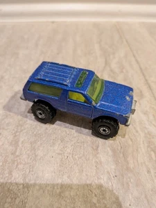 Blazer Chevy 4x4 vintage Hot Wheels copo de metal azul amarillo interior Puertas de apertura - Imagen 1 de 3
