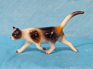 Retired Hagen Renaker Prowling Calico Cat - Picture 1 of 4