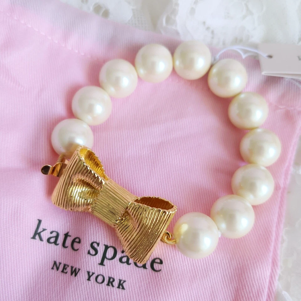 Kate Spade Gold All Wrapped up in Pearls Bow Faux Pearl Bracelet O0ru1740