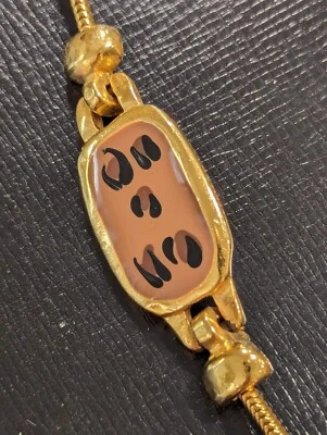 Pulsera Anne Klein Tono Oro 7", Esmalte Tostado y Negro Estilo Identificación Excelente Estado.  Foto 1 de 4