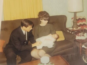 Candid Color Photograph Couple with Baby in Christening Gown - Picture 1 of 10