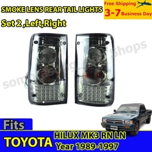 R2 SMOKE LENS LH+RH BACK REAR TAIL LIGHTS LAMP TOYOTA HILUX MK3 RN LN 1989-1997 - Bild 1 von 6