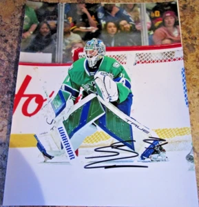 ARTURS SILOVS SIGNED 8X10 MATTE PHOTO ABBOTSFORD CANUCKS VANCOUVER CANUCKS (K) - Picture 1 of 2