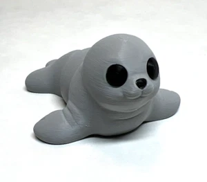 Lindo juguete calmante ZOU3D Flexi articulado bebé sello gris Cutie - Imagen 1 de 7