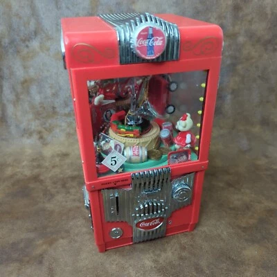 Máquina de garra de banco de monedas Enesco Coca-Cola musical 1997 vintage agarrador de coca-cola Foto 1 de 4