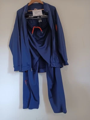 Chaqueta y pantalón Under Armour cremallera completa. Chándal XL azul y naranja para hombre Foto 1 de 2