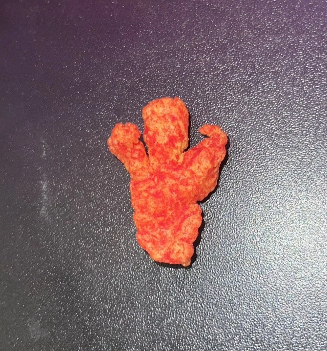 Rare Flamin Hot Cheetos Human  - Bild 1 von 1