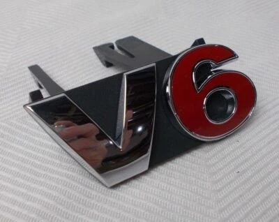 Fits; Volkswagen Jetta " V-6 " Grille Emblem NOS 1J5 853 679 A GQF - Image 1 of 4