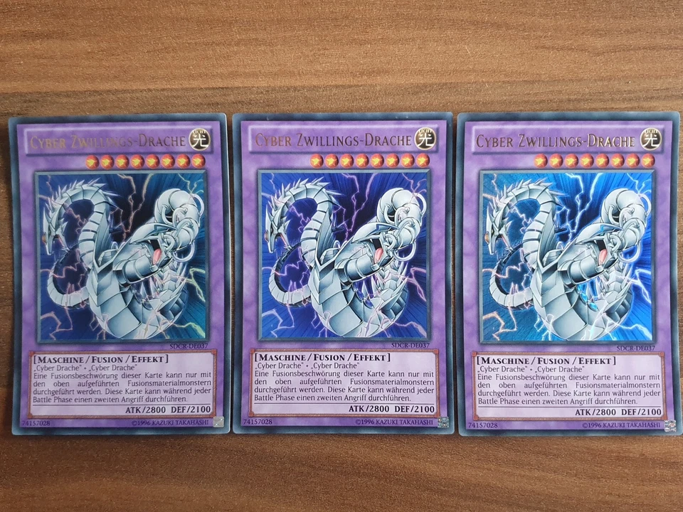 3x Yu-Gi-Oh! SDCR-DE037 Cyber Zwillings-Drache Ultra Rare NM 1st Ed - Bild 1 von 1