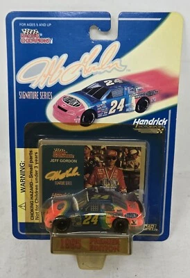 RACING CHAMPIONS 1995 JEFF GORDON SIGNATURE SERIES 1:64 NASCAR PREMIER  - Image 1 of 4