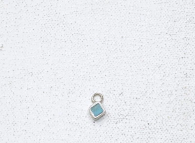 Colgante con dije indio turquesa y plata de ley Foto 1 de 2