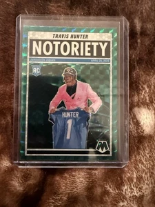 2025 Panini Mosaic - Notoriety Travis Hunter #12 Green Mosaic Prizm (RC) - Picture 1 of 2