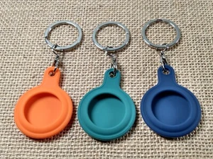 AIRTAG Schutzhülle Apple - Orange/Grün/Blau Rund Silikon - 3 Stück #3-9 - Bild 1 von 4