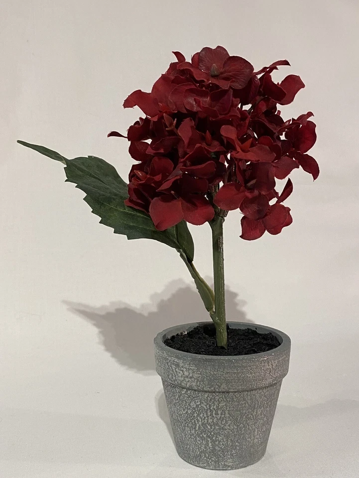 UNA FLOR DE NAVIDAD DE SEDA ROJA "MINI HORTENSIA" CON ACABADO PLATEADO Foto 1 de 1