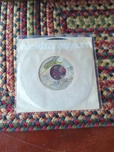 THE NEW SEEKERS BOOM-TOWN/I'D LIKE TO TEACH THE WORLD VINYL 45 ELEKTRA Record - Picture 1 of 4