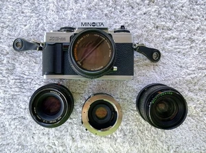 Minolta XG-M Spiegelreflexkamera zwei 50mm Festbrennweiten, 28mm Objektiv, TOYO 2X Tele Converter - Bild 1 von 17