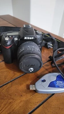 Nikon D D90 12.3MP Digital SLR Camera - Black (Kit w/ VR II 18-200mm Lens) - Image 1 of 4