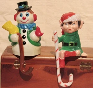 2 VTG J.S.N.Y. PAINTED PLASTIC CHRISTMAS STOCKING SHELF HOOKS - SNOWMAN and ELF - Picture 1 of 6