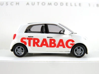 Busch 49562 Smart Forfour (2014) "STRABAG" in weiß 1:87/H0 NEU/OVP - Bild 1 von 4