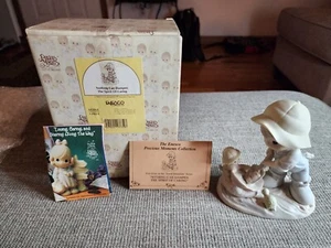 Precious Moments Figurine 603864  Nothing Can Dampen The Spirit Of Caring 1993 - Picture 1 of 8