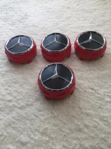 JUEGO DE 4 TAPACUBOS ROJOS ELEVADOS RUEDA MERCEDES BENZ 75MM - Imagen 1 de 5
