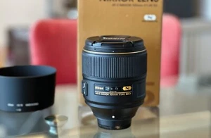 Nikon 105mm f/1.4E AFS NANO 105 1.4 AF-S del distribuidor fotografía privada - Imagen 1 de 6
