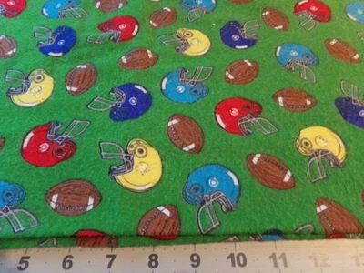 31"  X 40"  VINTAGE FLANNEL COLORFUL HELMETS/GREEN/ RED/ COTTON #1467 - Image 1 of 3