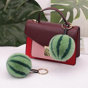Llavero de piel de visón real sandía bola de piel bolsa pompón dije teléfono colgante regalo - Imagen 1 de 4
