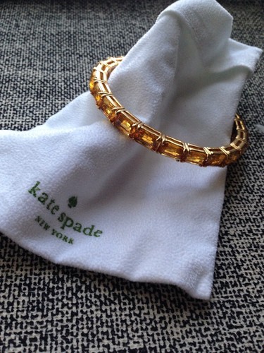 Bracciale Kate Spade oro e ambra arancione gemma