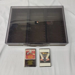 Vtg Flair 42 Slot Cassette Tape holder Clear Briefcase style w/ eagles & ZZ top - Foto 1 di 16