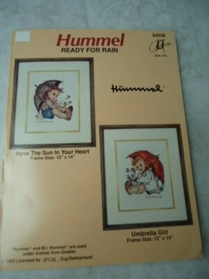 JCA Hummel “Have The Sun In Your Heart” & “Umbrella Girl” Counted Cross Stitch P - Image 1 of 4
