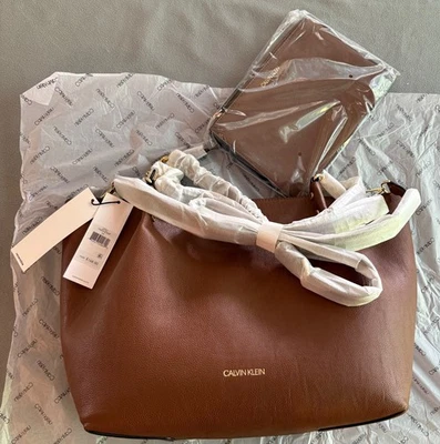 Calvin Klein reversible tote NEW with tags; brown/black; wristlet pouch also - Image 1 of 4