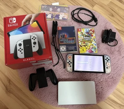Nintendo Switch OLED Weiß mit Zubehörpaket 2 Spiele Mario Party - Bild 1 von 4