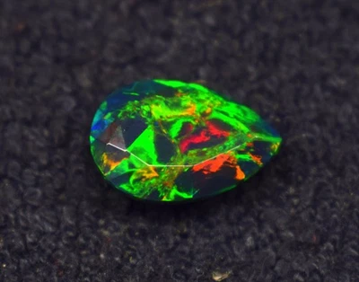 5.4 CT Fire Black Smoked Ethiopian Opal Pear Faceted Gemstone 16.6X11.3X7.7 mm - Image 1 of 4