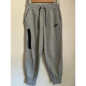Nike Tech Fleece Pantaloni Joggers Donna Nero Grigio Erica CW4292-063 Taglia S - Foto 1 di 8