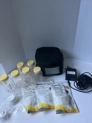 Lote avanzado de bolsas refrigeradoras Medela Pump In Style, cables botellas repuestos Foto 1 de 4