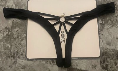 NUEVO CON ETIQUETAS BRAGAS TANGA VICTORIA'S SECRET NEGRO LISO TIRAS ORO ANILLO SIN ENTREPIERNA Foto 1 de 4