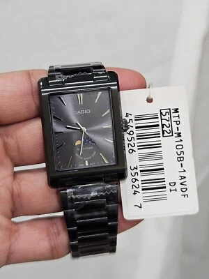 ✅ "Casio Black Moon Phase Watch – MTP-M105B-1AVDF, Elegant Analog Men's Watch" - Image 1 of 4