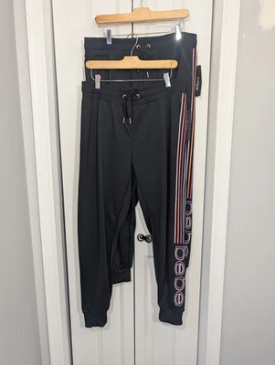 Bebe Sport Nuevo con Etiquetas Para Mujer Talla Grande Logo Joggers Pantalones de Chándal Negros Lote de 2 Tobillos Foto 1 de 4