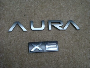 2007-2009 Saturn Aura XE Trunk Logo Emblem Badge Nameplate lettering GM OEM - Picture 1 of 2