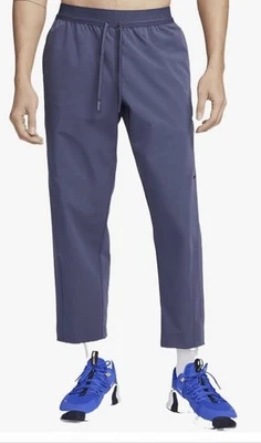 Nike A.P.S. Calça versátil tecida DRI-FIT - FN3014-437 - grande - azul marinho - nova com etiquetas - Imagem 1 de 4