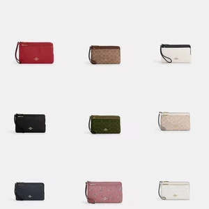 NEU MIT ETIKETT COACH GELDBÖRSE MIT DOPPELREISSVERSCHLUSS UND HANDSCHLAUFE - Bild 1 von 38