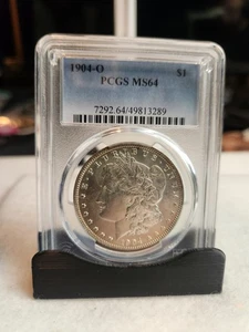 1904-O MS64 Morgan Silver Dollar In PCGS Holder Appears Very Slight Rotation - Picture 1 of 4