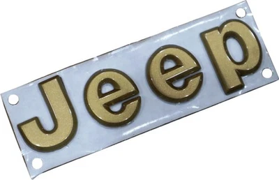 94-96 Jeep Grand Cherokee 5DS01PY2 Gold Nameplate Genuine Part NOS OEM Factory - Image 1 of 4