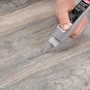 Masilla de relleno de madera gris claro para arañazos, agujeros de clavos, también para vinilo, laminado - Imagen 1 de 5