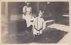 RPPC 1914 UNUSUAL RPPPC, Young Boy named Theodore belted tied to a Ground Stake!