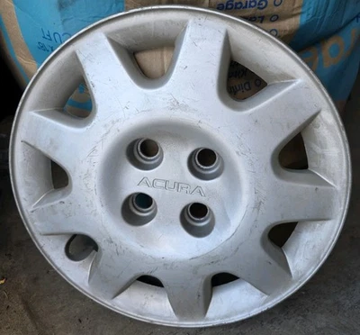 Одинарный б/у колпак колеса Acura Integra (1994, 1995) 14 дюймов, 44733ST7A20, #63005 - Изображение 1 из 2