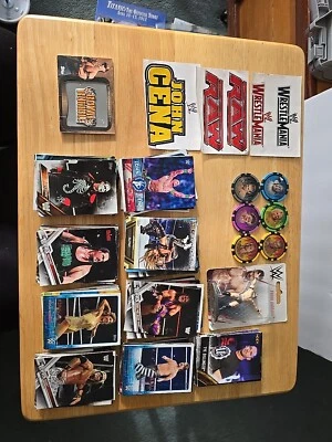117 WWE Trading Cards, 3 Stickers, 6 Poker Chips, 1 Mini Figure Lot, 1 Patch - Image 1 of 4