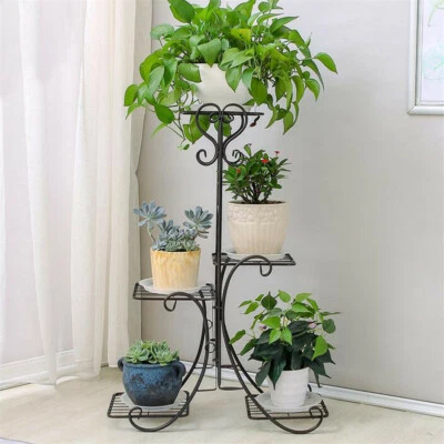 Hermoso soporte para plantas curvas de 4 niveles soporte para jardinera de flores de jardín estante de hierro Foto 1 de 4