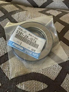 New Genuine OEM Mazda Wheel Seal S381-26-157A - Foto 1 di 2